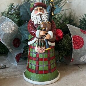 Jim Shore Santa playing the Bagpipes Figurine